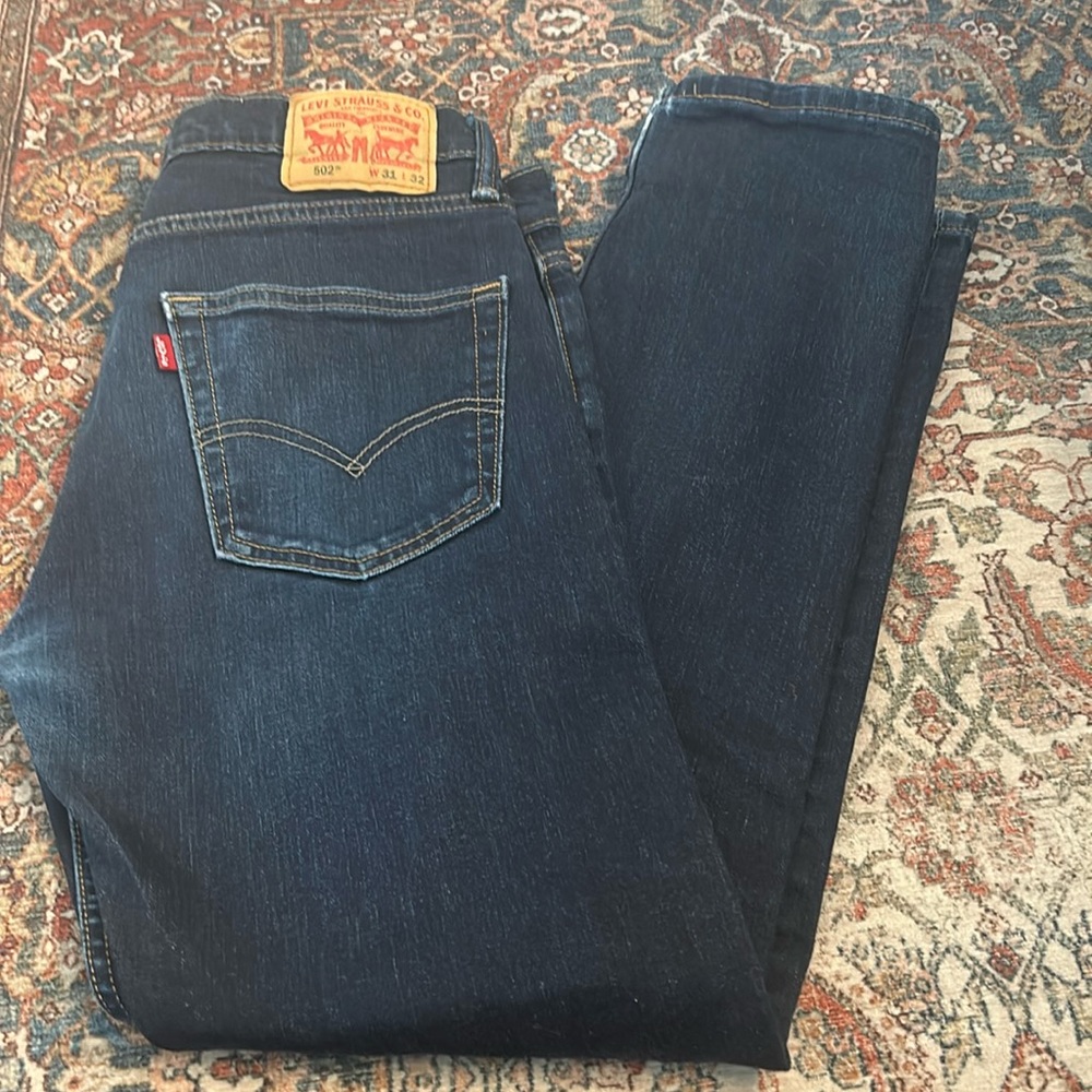 Levi’s 502 straight leg jeans. 31W 32 L